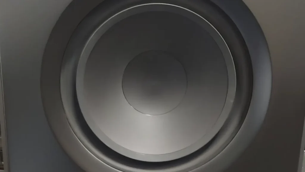 Front-facing view of the 12-inch carbon-loaded polypropylene cone driver of the Paradigm Defiance V12 subwoofer without the grille.
