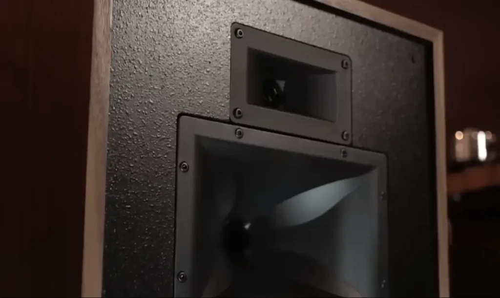 The front baffle of the Klipsch Forte IV speaker, showing the horn-loaded tweeter and midrange driver