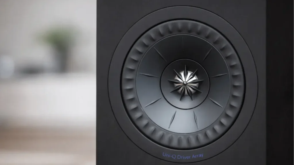 Side profile of KEF Q150 speaker showing the Uni-Q driver branding and driver texture.