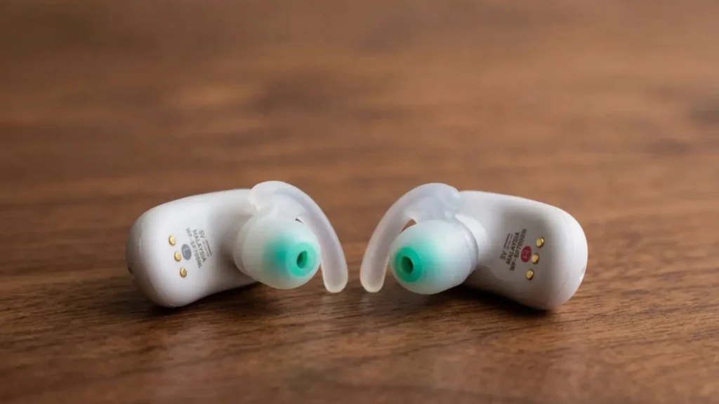 The left and right Sony WF-SP700N earbuds shown side-by-side
