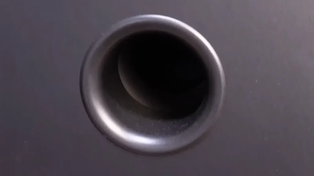 A close-up of the large, back-firing port on the Monitor SE 8000F